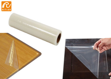 Un buen precio. Estiramiento protector plástico transparente del carrete de película de la protección de la superficie del PE para los muebles en línea